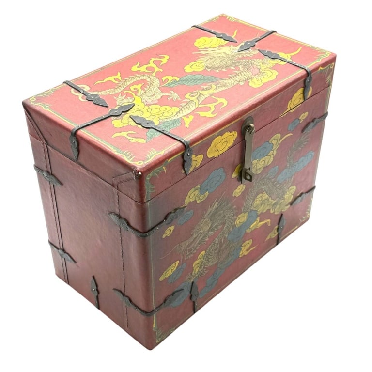 CHINOISERIE RED & GOLD DRAGON STORAGE CHEST 13": Decorative chinoiserie storage chest featuring gold-toned dragons amid yellow and blue clouds against a rich red, textured leather-look covering. Dragon decoration continues across the hinged lid, acc