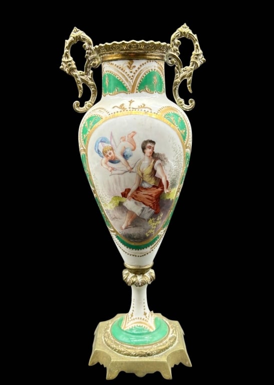 ANTIQUE FIGURAL PORCELAIN BRONZE URN 11": Elegant antique Continental porcelain urn or garniture vase with ornate gilt-bronze/brass mounts and twin scrolling handles. The slender baluster-form porcelain body is richly decorated with hand-pain