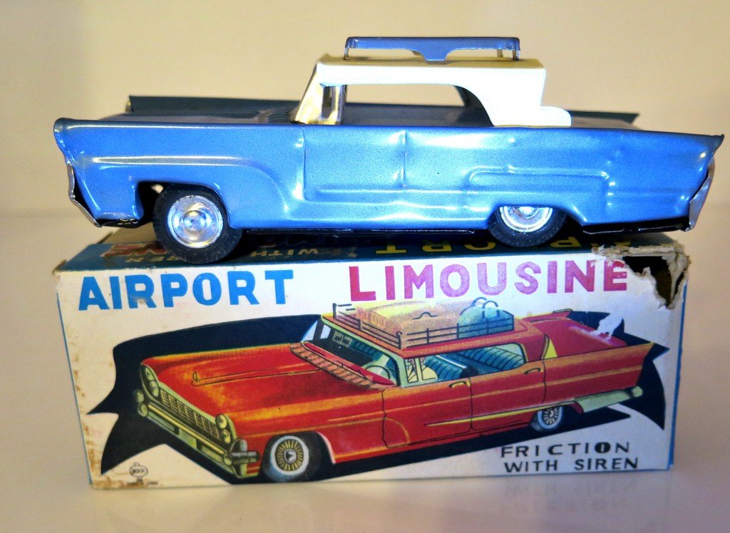 Airport Friction Limousine with Siren – Japanese Made –: Airport Friction Limousine with Siren – Japanese Made – KKK Toy Company – Tin – Minimal Signs of Wear – With Box – Box has some staining and tears – Measures Approx. 6” Long x 2 ¼” 