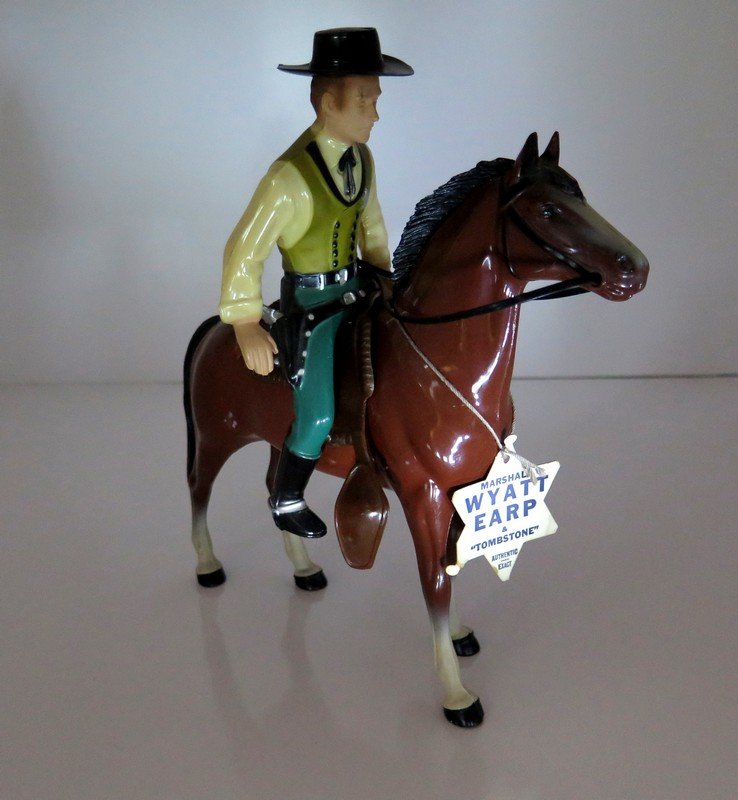 Hartland Wyatt Earp Marshall & Tombstone Ca. 1950 –: Hartland Wyatt Earp Marshall & Tombstone Ca. 1950 – Wyatt is Removable - Complete with No Damage – There is a Removable Gun in Wyatt’s Holster – Mint Condition & Includes Original Tag – Meas