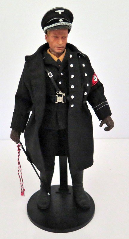 Original Ca. 1990’s Nazi – Believed to Be a Dragon: Original Ca. 1990’s Nazi – Believed to Be a Dragon Brand (We did not want to remove uniform in case of damage) – Complete with All Accessories – Even Has Swagger Stick, Badges, Luger, Hat and 