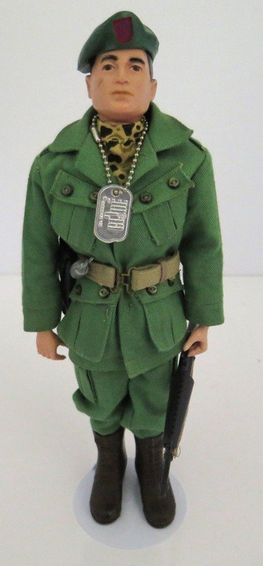 Original Ca. 1960’S G.I Joe Green Beret – Complete with: Original Ca. 1960’S G.I Joe Green Beret – Complete with Accessories – Badge, Beret, Dog Tags, M-16, .45, Web Belt with Brown Boots, Machete and Full Uniform – Slight Scuff on Head – Near Min