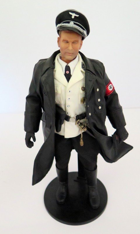 Nazi SS Soldier – Complete with Accessories – Dragon: Nazi SS Soldier – Complete with Accessories – Dragon Mfg. – Includes Luger, Issued Dagger, Leather Coat, Hat, Shirt and Trousers, Black Tall Boots – Near Mint Condition with No Noticeable Defe