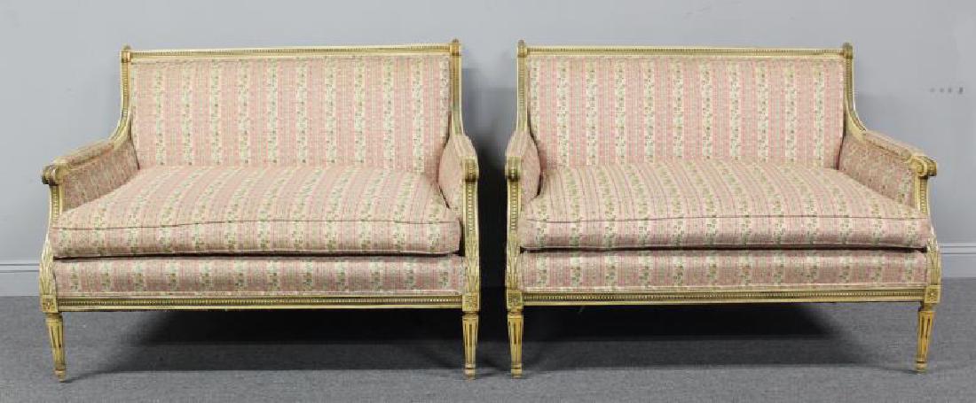 Pair of Louis XVI Style Paint Decorated and: Upholstered Settees. From a Greenwich, CT estate. - Dimensions: 48" w x 26" d x 36" h.