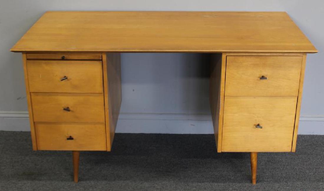 Midcentury Paul McCobb Kneehole Desk.: Blonde wood and metal T Pulls. From a Long Island, NY estate. Dimensions: 53" w x 26" d x 29" h.