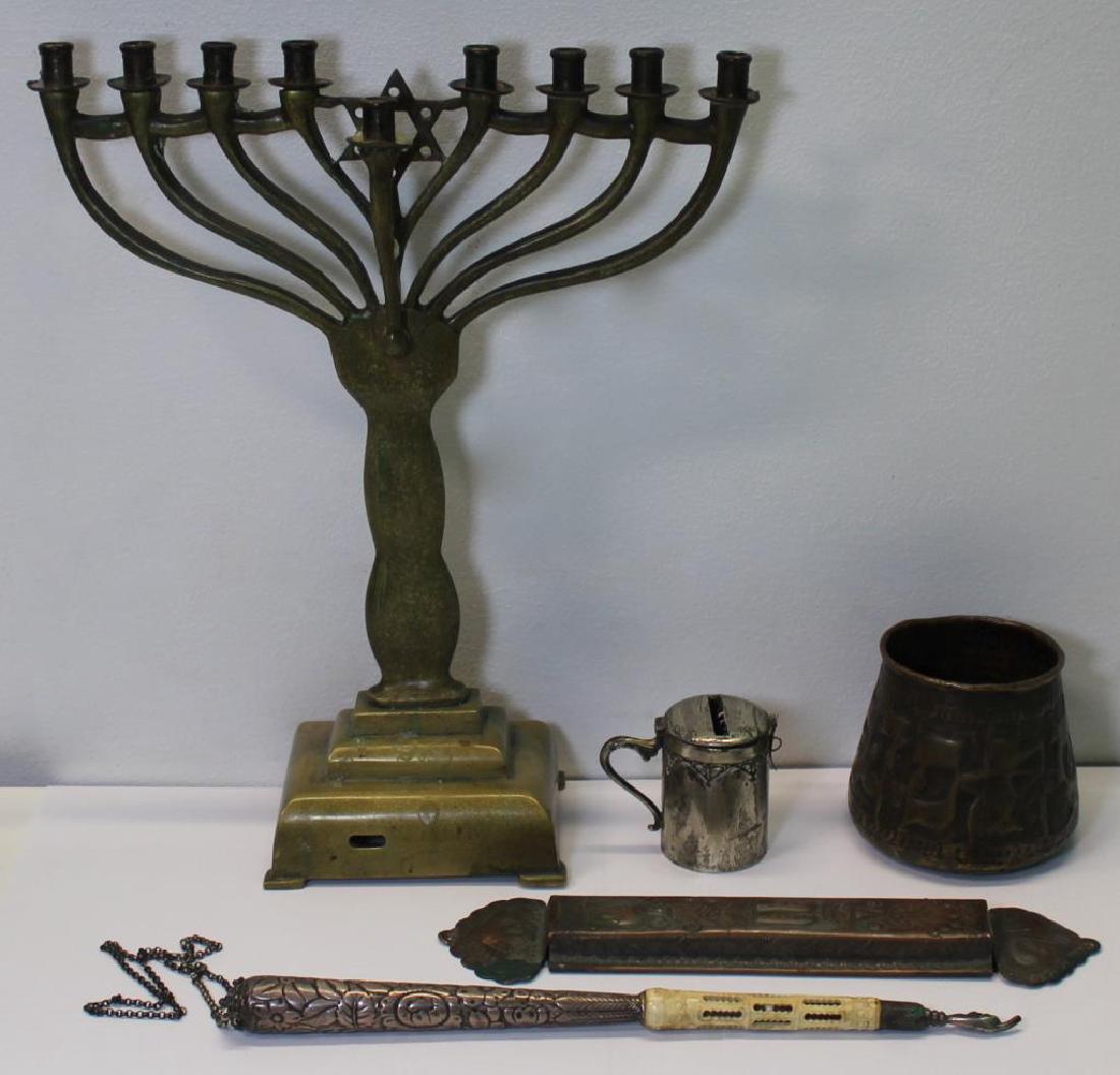 JUDAICA. Assorted Grouping of Judaica Items.: Includes a German .800 silver Tzedakah box; a Bronze menorah; a silver and carved bone? yad or Torah pointer; a large mezuzah; and a "Ben Porat Yosef" circumcision cup. Total approx. weight of Tzedaka