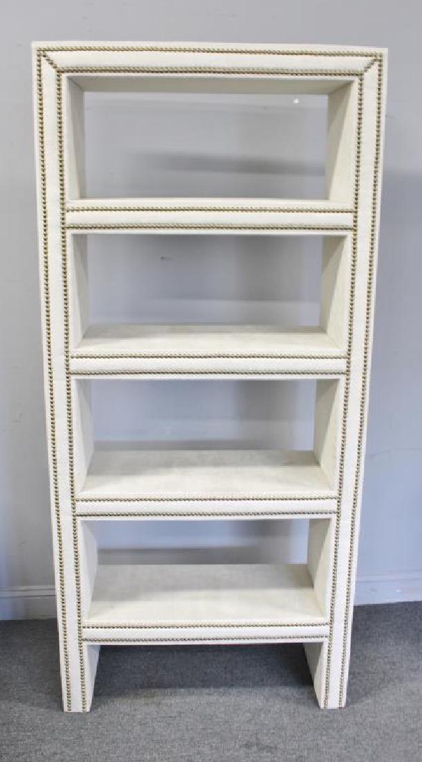 Midcentury Style Studded and Upholstered Etagere.: From a Harrison, NY estate . - Dimensions: 34" w x 17" d x 74" h.