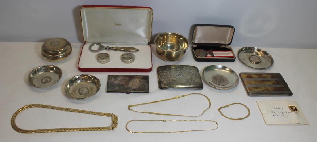 GOLD & SILVER. Grouping of Assorted Jewelry and: Decorative Objects. Includes an 1867-1967 Canadian Confederation coin mounted as a medal; a Cartier silver-plated card case; a Birks .935 silver cigarette case with inscription to interior; a 3 pc. Ca