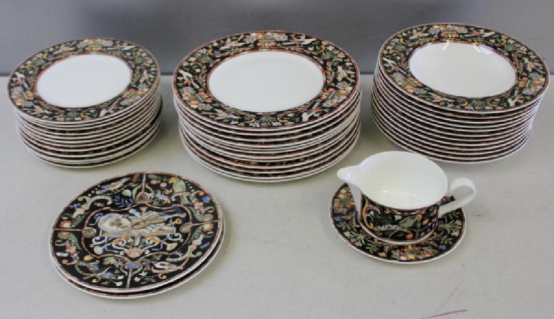 Villeroy and Boch "Intarsia" Partial Porcelain: Dinner Service. including 12 11" dinner plates, 12 9" luncheon plates, 12 9.75" soup plates, a saquce pitcer with underplate and 2 coordinating 9" luncheon plates. From a Tuxedo Park, NY estate.