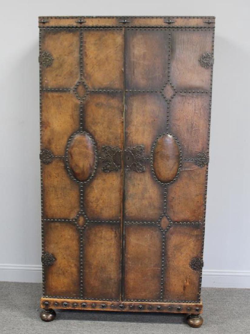Antique Leather Covered 2 Door Armoire. (1 of 1)
