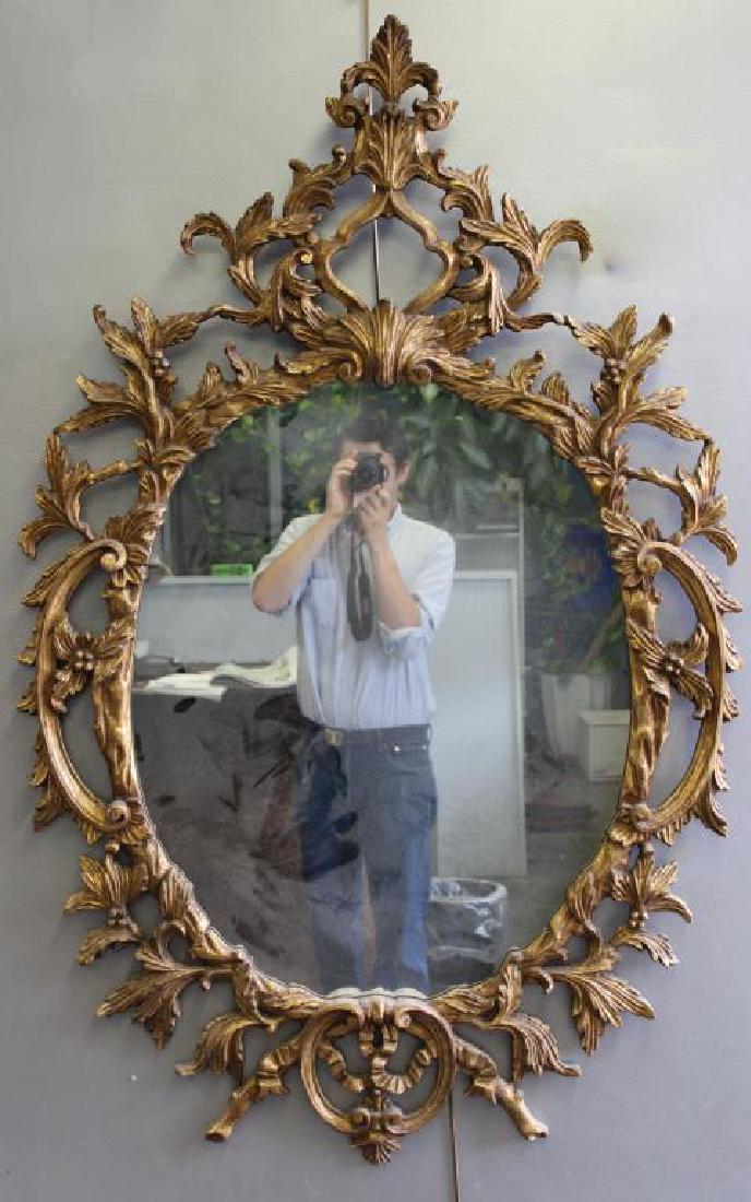 Antique Roccocco Carved Giltwood Mirror.: From a Forest Hills, Queens estate. - Dimensions: 57.5" h x 37" w.