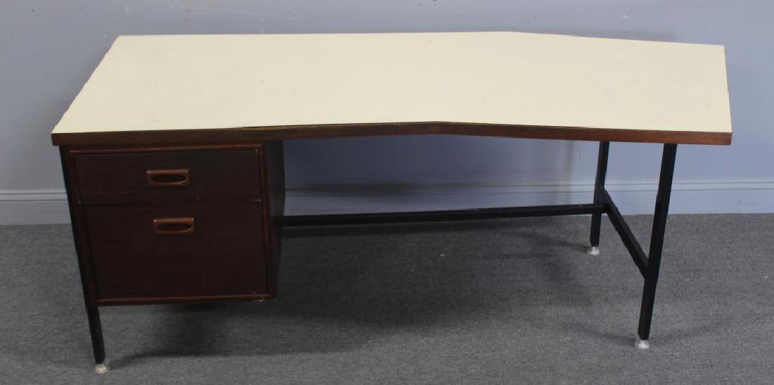 MIDCENTURY. De Coene Studios Belgium Desk.: Nice desk made on the angle and signed on the base. From a Bedford NY estate. Dimensions: 72" w x 30" d x 28.5" h.