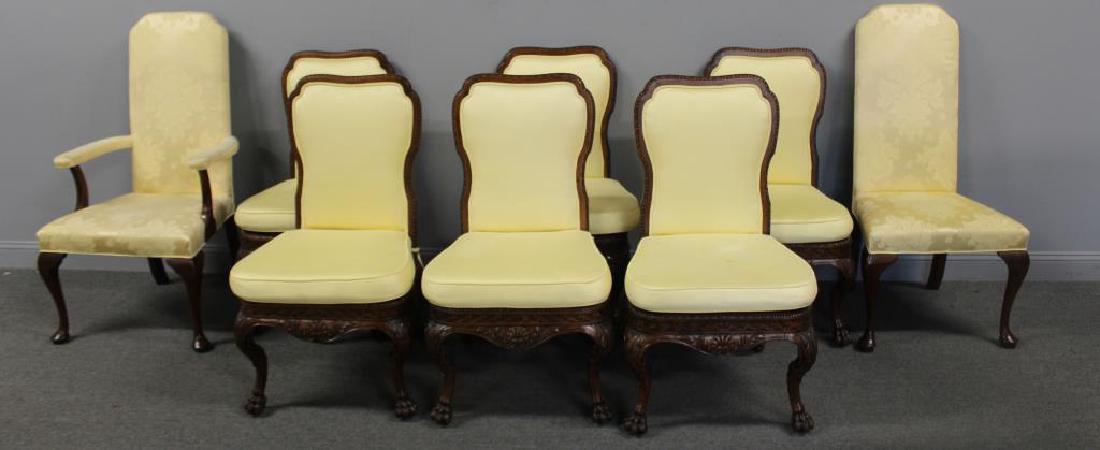 6 Antique English Carved and Upholstered Chairs: With Caned Seats . Very finely carved with nice patina and raised on claw feet . We have included 2 QA style chairs used by consignor for the head of the table . From a Greenwich. 25"D x 39"H x 22"W C