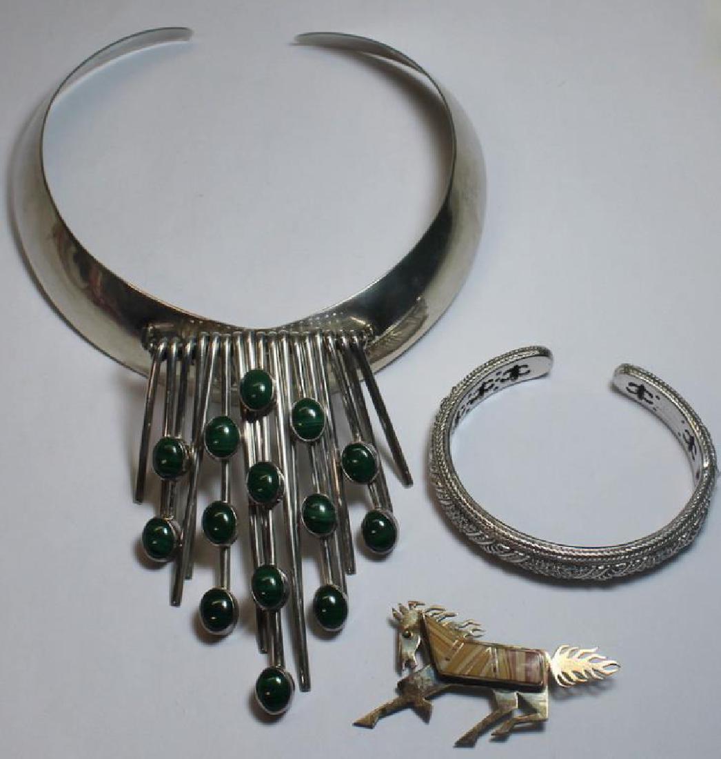 JEWELRY. Grouping of Signed Sterling Jewelry.: Includes a Sunrise sterling choker style length necklace with large malachite and sterling pendant - stamped, "Sunrise, Sterling" with pictorial hallmark and 2 additional stamps; a Judith Ripka sterli