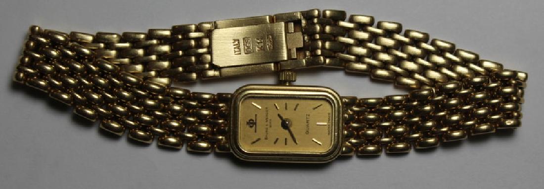 JEWELRY. Ladies 14kt Gold Baume & Mercier Watch. (1 of 8)