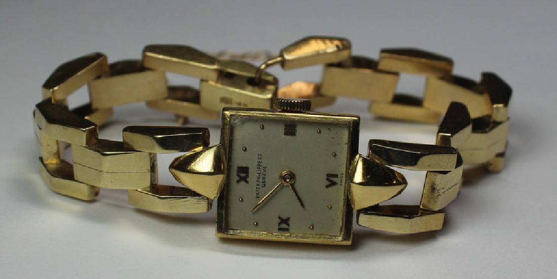 JEWELRY. Ladies 18kt Gold Patek Philippe Watch. (1 of 9)