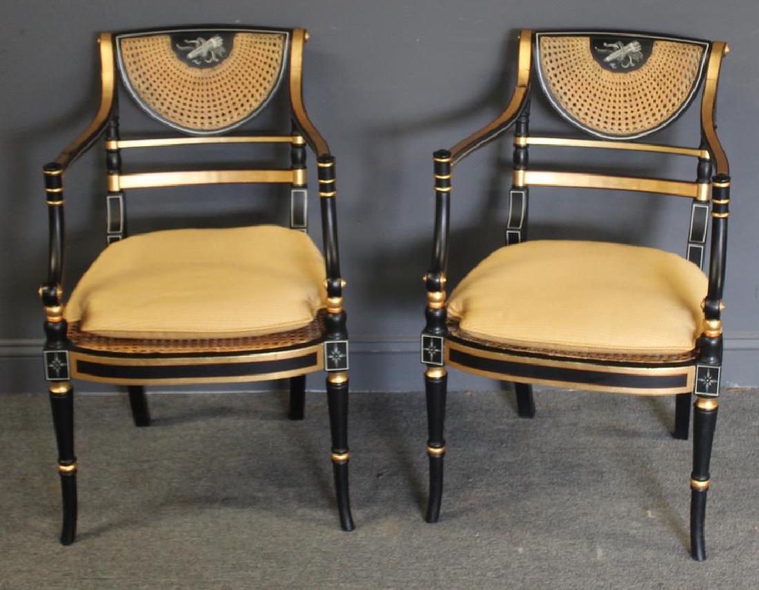 Pair of Regency Caned, Ebonised & Gilt Decorated: Arm Chairs. Very decorative and great quality. From a Rye, NY home. - Dimensions: 21" w x 27" d x 34" h.