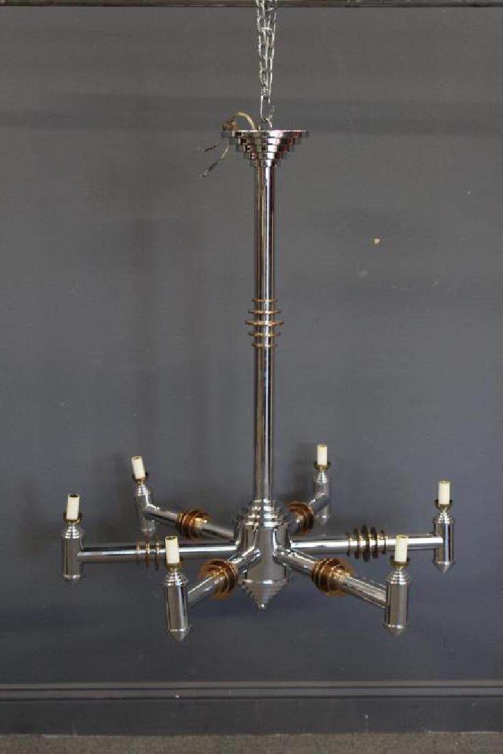 Vintage and Fine Quality Brass and Chrome: Chandelier. In the style of Atelier Petitor. Great looker and heavy duty. From a Long Island estate. Dimensions: 33" dia. 39" h.