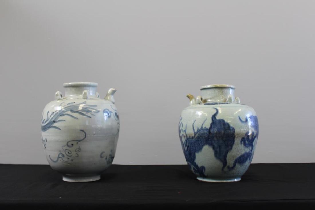 Pair Of Chinese Wine Jars: Decorated with stylised Dragons in underglaze.From a Wilton CT . 13.5"Hestate