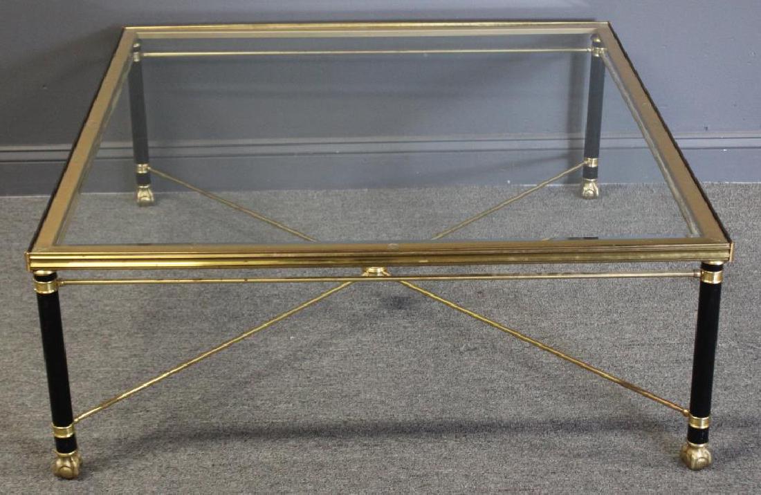 BAKER. Chapman Gilt and Ebonised Metal Coffee: Table. From a West Harrison, NY estate. Dimensions: 44" x 44" x 17.5" h.