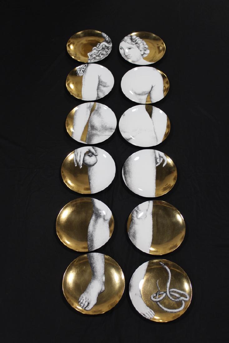 PIERO FORNASETTI Twelve-plates, "Eva": All signed PIERO FORNASETTI (1913 - 1988)Twelve transfer-decorated porcelain plates, "Eva," Italy; All marked EVA FORNASETTI MILANO MADE IN ITALY and numbered, with scroll "ALTO HAUT TO