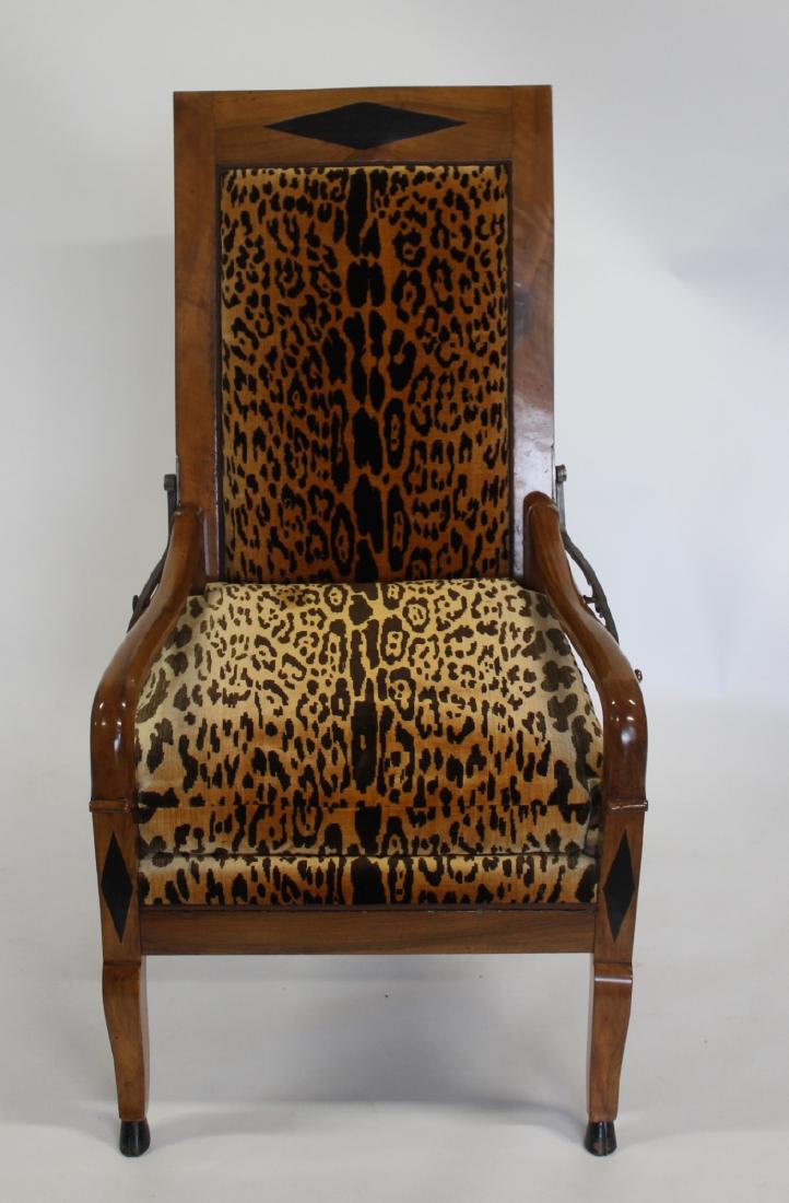 BIEDEMEIER. Birch and Lacquered Adjustable: Arm Chair. The rectangular padded back above an upholstered seat raised on cabriole legs. From a 605 Park Ave NYC estate. - Dimensions: 26 1/2" x 29" x 49 1/2" H