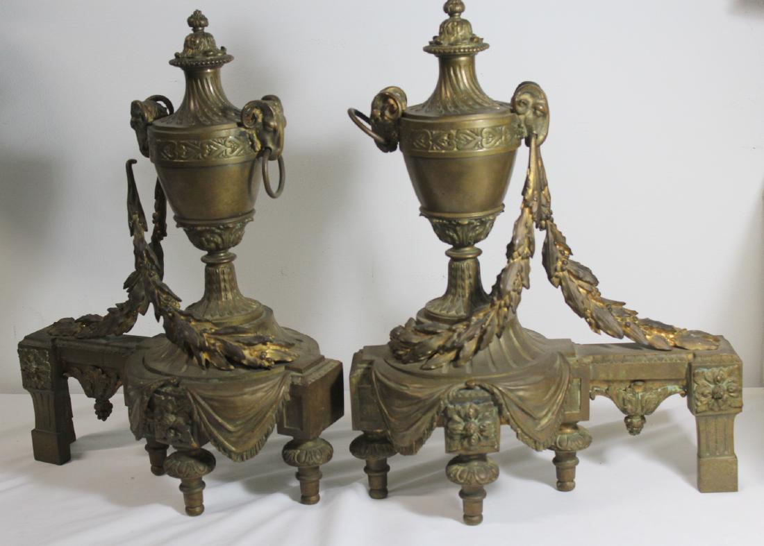 Pair of Antique Bronze Urn Form Andirons.: Good size and fine quality pair with Rams heads and swag decoration. From a Larchmont estate. - Dimensions: 18" x 16"H