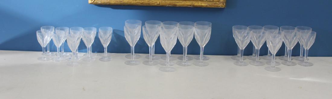 Lot of Assorted Baccarat Stemware.: Crystal "Genova" mixed lot of wine glasses and cordial Glasses. Eleven Glasses of each. Cordial: 5.5"H White Wine: 6 3/8"H Red Wine: 7 1/8"H