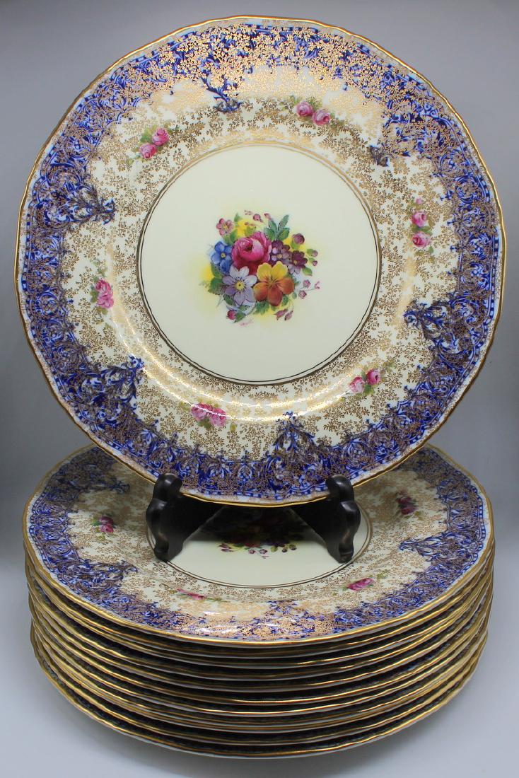 12 Signed M. Hunt Royal Worcester Dinner Plates.: With floral and gilt decoration. Signed, "M. Hunt". From an E 44th St, Manhattan apt. - Dimensions: Approx. 11" in diameter.