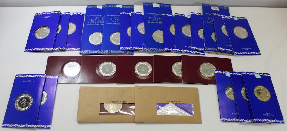 SILVER. (26) Franklin Mint Silver 100 Greatest: Masterpieces Medals. (26) "Les 100 Plus Grands Chefs-D'OEuvre Argent 1er Titre" silver medals including (1) Adam et Eve chasses du Paradis; (1) Portrait de Francois ler; (1) Erasme de Rotter