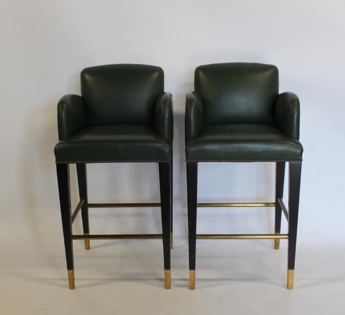 DONGHIA. Pair of Leather Upholstered Stools.: Signed on the base Donghia and from a New Rochelle estate. - Dimensions: 12" x 24" x 45"H