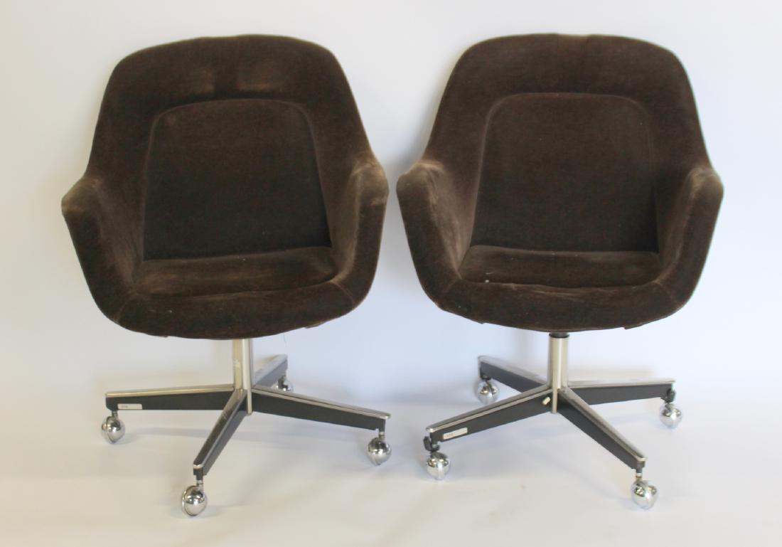 Pair Knoll Upholstered Brown Chairs on Wheels: Chrome base. From a Stamford CT estate. - Dimensions: 26" w x 25" d x 36" h