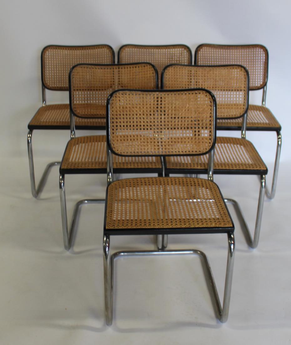 6 Knoll Marcel Breuer Chairs.: Black and Tan color with one chair needing repair. - Dimensions: 18w x 20.5d x 31.5h