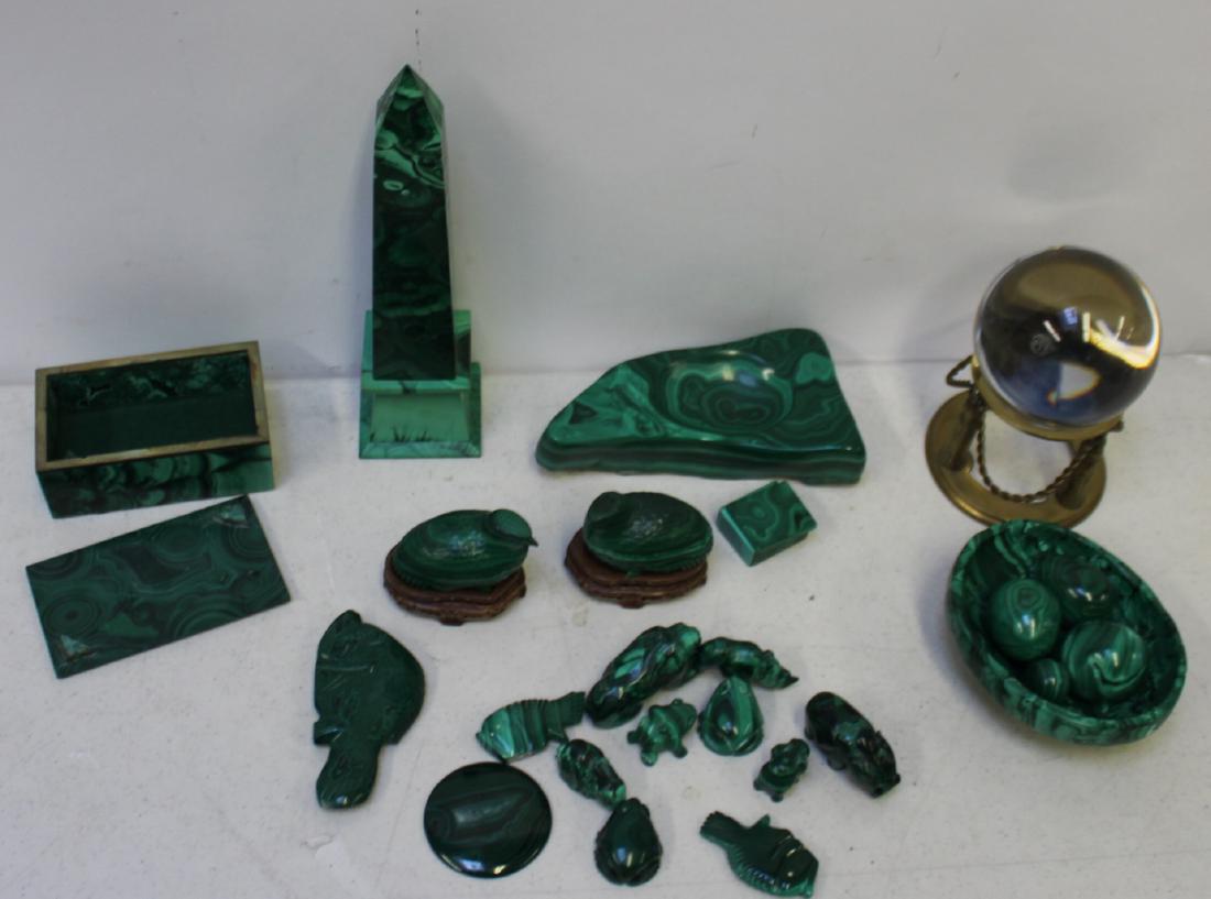 Lot of Assorted Collectible Malachite Cabinet: Items. To include 3 fish, 3 frogs, 2 birds on base, 1 disc, 1 bowl, 4 eggs, tiny box, medium box, 1 rhino, 1 elephant, 1 rabbit, 1 lion, 1 large dish (ashtray?), 1 crystal ball, 1 sculpture. From a Br