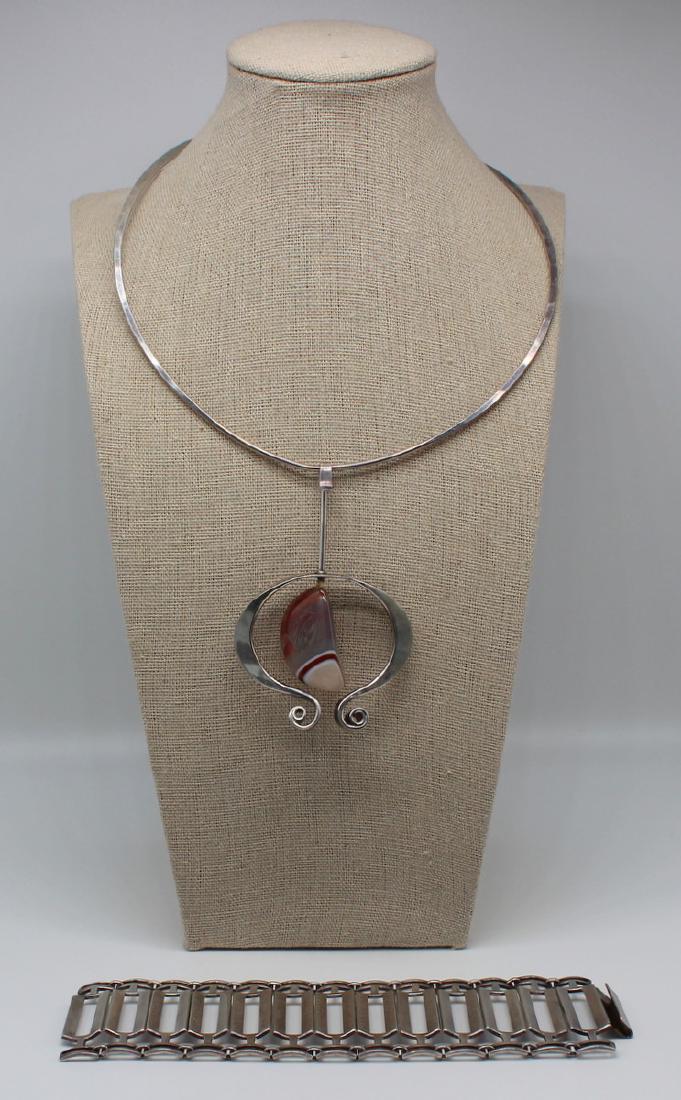 JEWELRY. Tone Vigeland Sterling Demi-Parure.: Includes a Tone Vigeland sterling pendant with scroll details and central polished banded agate drop - with Tone Vigeland pictorial hallmarks, "Sterling 925S Norway"; accompanied by a Tone V