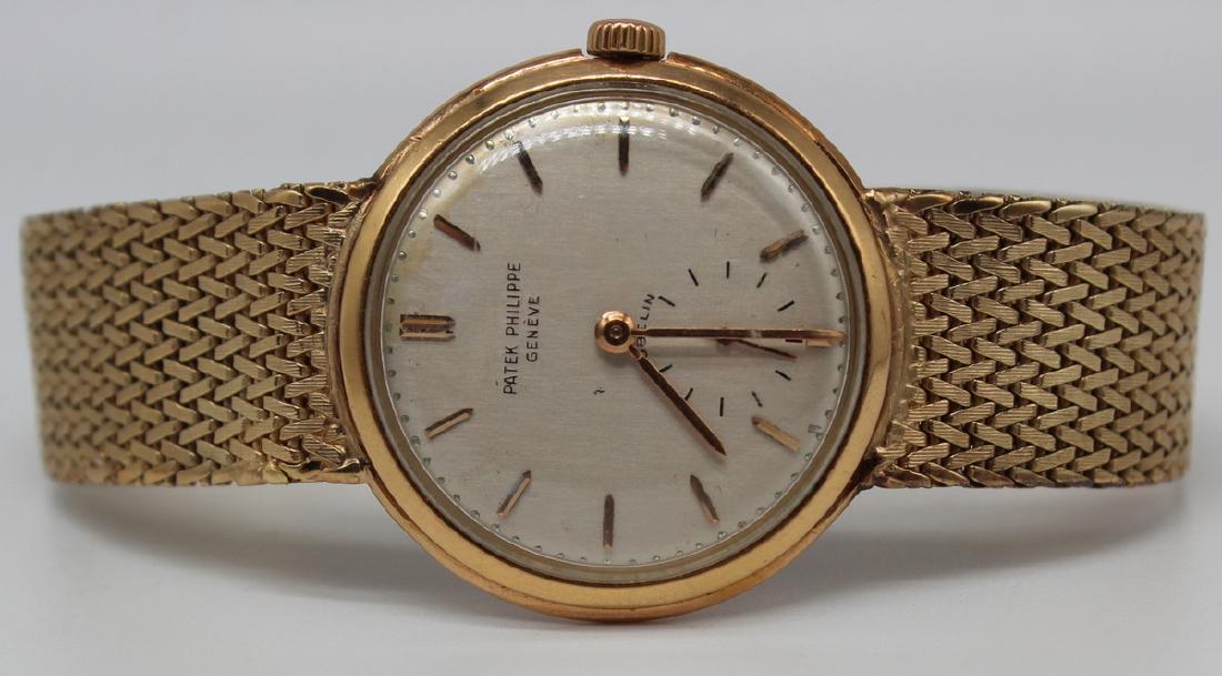 JEWELRY. Men's 18kt Gold Patek Philippe Gubelin: Wrist Watch. Vintage men's 18kt gold Patek Philippe watch face with subsidiary seconds dial, Gubelin. With a Patek Philippe & Co. movement, no. 740322. Interior of case stamped, "0.750 Patek