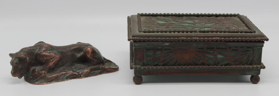 Grouping of Tiffany Studios Bronze Cabinet Items.: Includes a Tiffany Studios bronze paperweight depicting a crouching lioness, stamped to underside, "Tiffany Studios New York 887". Accompanied by a Tiffany Studios pine needle lidded box wit