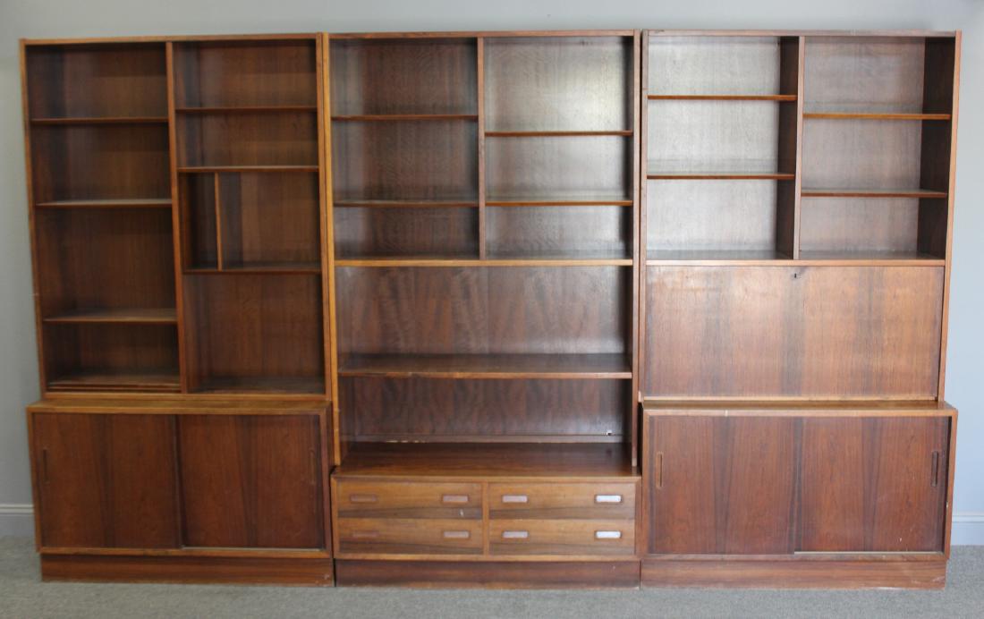 MIDCENTURY. Danish Modern Rosewood Wall Unit .: Nice original patina in 3 units and 6 pieces. Drop down bar, sliding door cabinets and open front. From an Armonk estate. Dimensions: 128"W x 17"D x 77"H