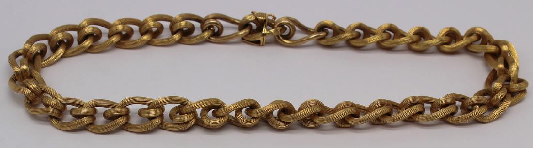 JEWELRY. 18kt Gold Choker Length Necklace.: Comprised of ribbed links with matte finish. Total approx. weight is 21.2 dwt. From a White Plains, NY estate. Dimensions: necklace measures approx. 14.75" in length.