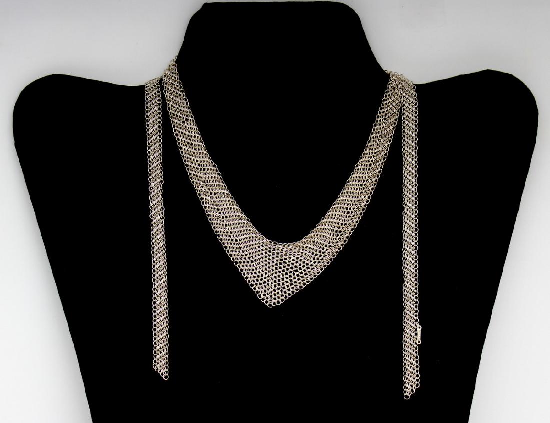 JEWELRY. Peretti for Tiffany & Co. Sterling Mesh: Necklace. Elsa Peretti for Tiffany & Co. sterling mesh scarf necklace. With plaque reading, "Peretti, T&Co 925". Total approx. weight is 0.68 troy oz. From a White Plains, NY estate.