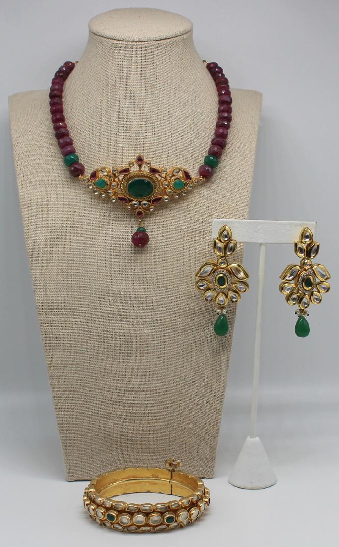 JEWELRY. Mughal Style 4 Pc. Jewelry Suite.: Includes a pair of chandelier form earrings set with faceted and polished stones, and decorated with beautiful enamel work verso; a near matched necklace comprised of faceted beads and a central penda