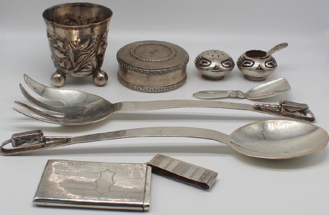 SILVER. Misc. Silver Grouping Inc. Jensen.: Includes a 2 pc. Jose Marmolejos Mexican sterling salad serving set; antique German silver cup with floral repousse work and three ball feet - with city stamp of Nuremburg, pictorial hallmark, and uni