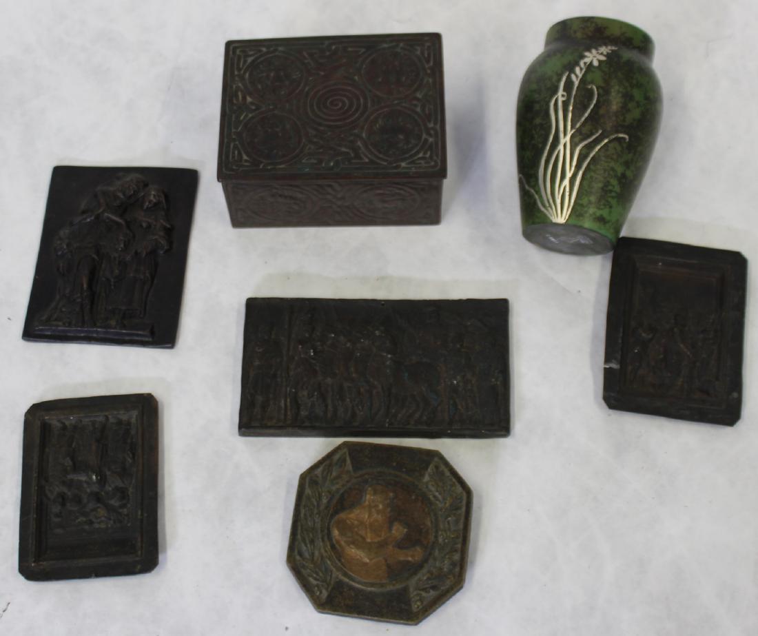 Collectible Lot Of Assorted Bronze /Metal Items.: A Tiffany studios box 4.5" x 3.25" x 2" h, a Hennz overlay vase 4.25" h and assorted plaques from 3.25" x 3.25" to 2.75" x 5.25". From the estate of John Anderson.