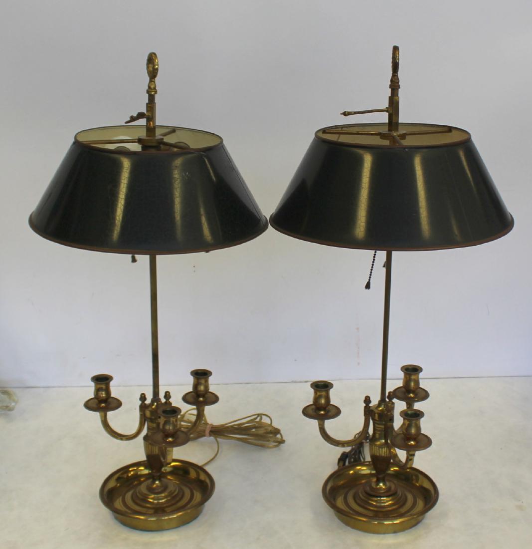 Pair of Antique Bronze Builloitte Lamps With: Tin shades. Accompanied by a copy of a Sotheby's April 23rd, 1986 appraisal stating these are a, "Pair of Louis XVI Style Ormolu Bouillotte Lamps Each with a circular base with beaded border, vasiform
