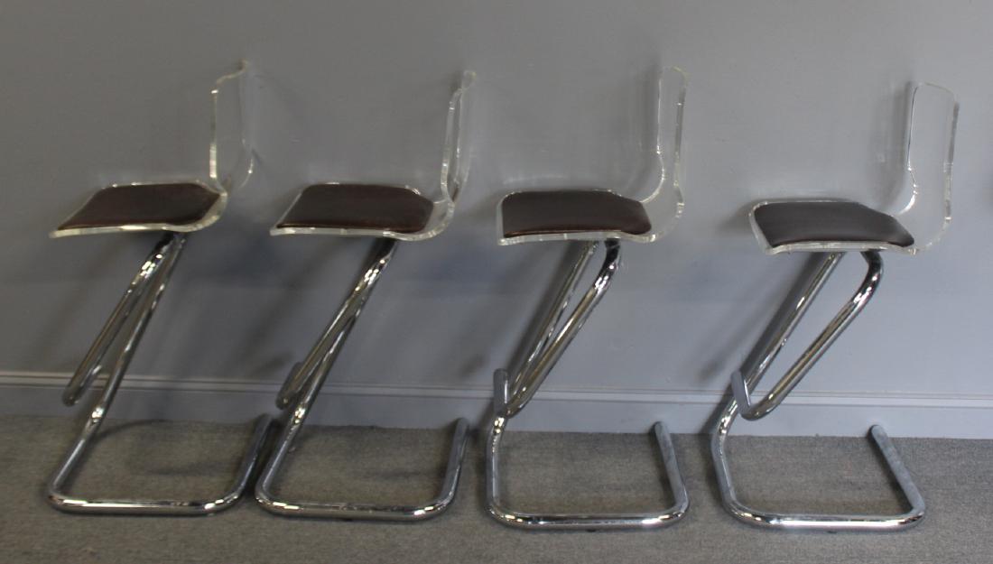 MIDCENTURY. 4 Lucite And Chrome Stools .: Good heavy duty quality. From a New Jersey estate . - Dimensions: 22" x 21" x 41"H