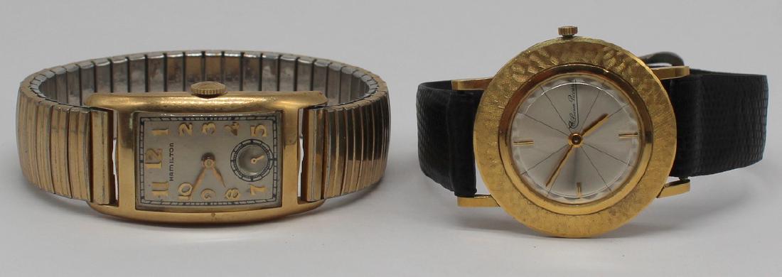 JEWELRY. (2) Gold Watches, 18kt Lucien Piccard &: 14kt Gold Hamilton. Includes an 18kt yellow gold Lucien Piccard men's wrist watch with textured finish to gold work - Lucien Piccard movement, 17 jewels; exterior of stamped, "Lucien Piccard, 18k