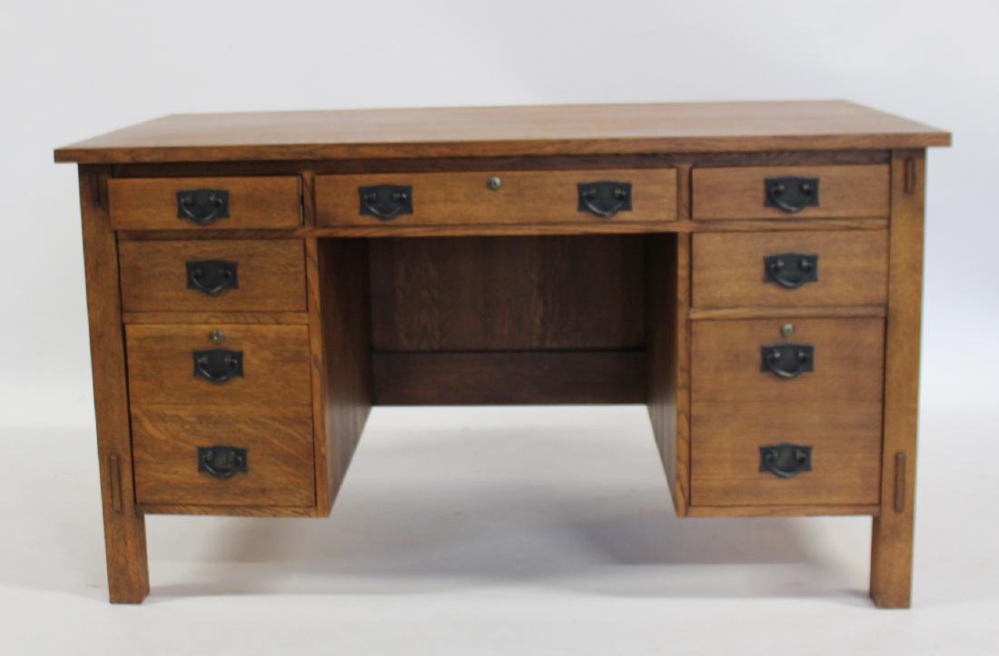 STICKLEY AUDI. Signed Oak Kneehole Desk.: From a Scarsdale estate. - Dimensions: 53.75" x 28" x 30.25" h