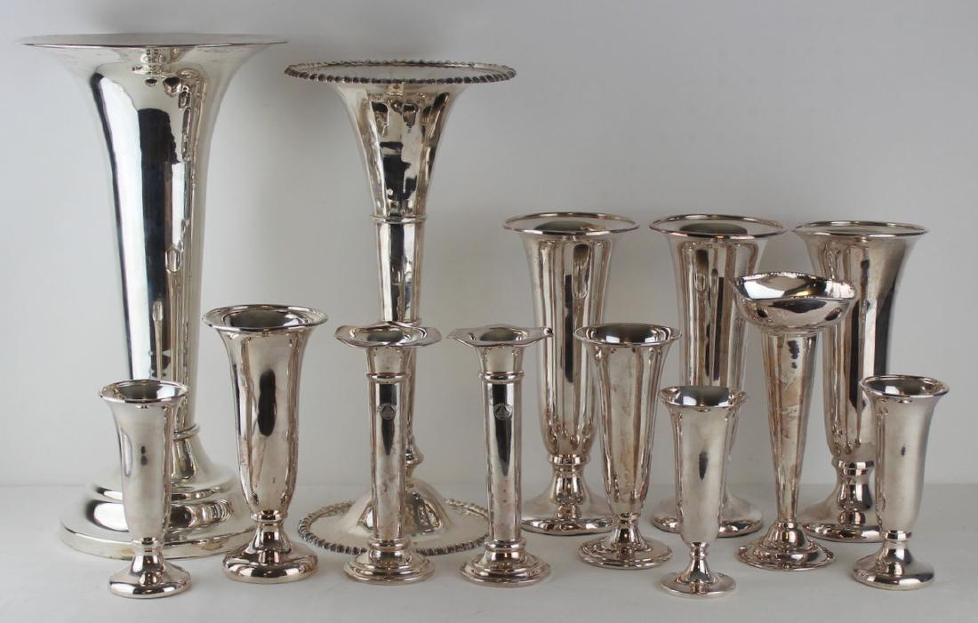 Grouping of 13 Trumpet Vases.: Includes (3) 10" vases; (1) 6" vase; (2) 6.125" vases; (1) 7.25" vase; (1) 8.125" vase; (2) Elkington silverplate A Simonds Hotel vases; an English vase; an Elkington & Co