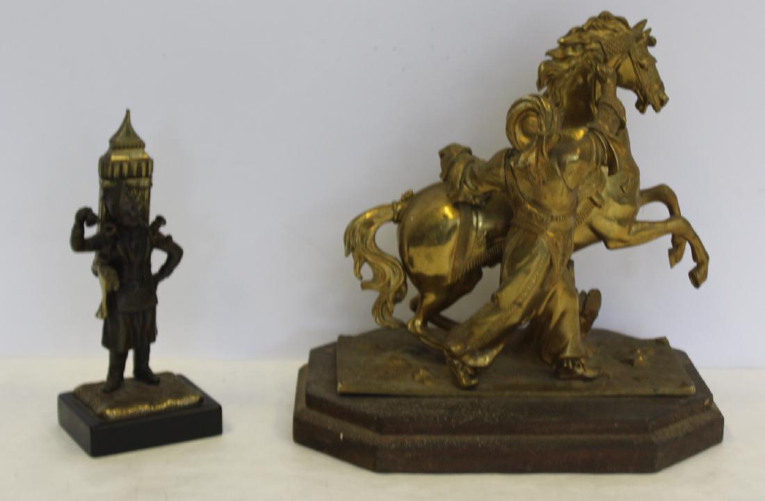UNSIGNED. Lot Of 2 Bronze Sculptures.: To include a horse and handler 9" x 9" and a water carrier 8"H. From a Garden City, L.I. estate.