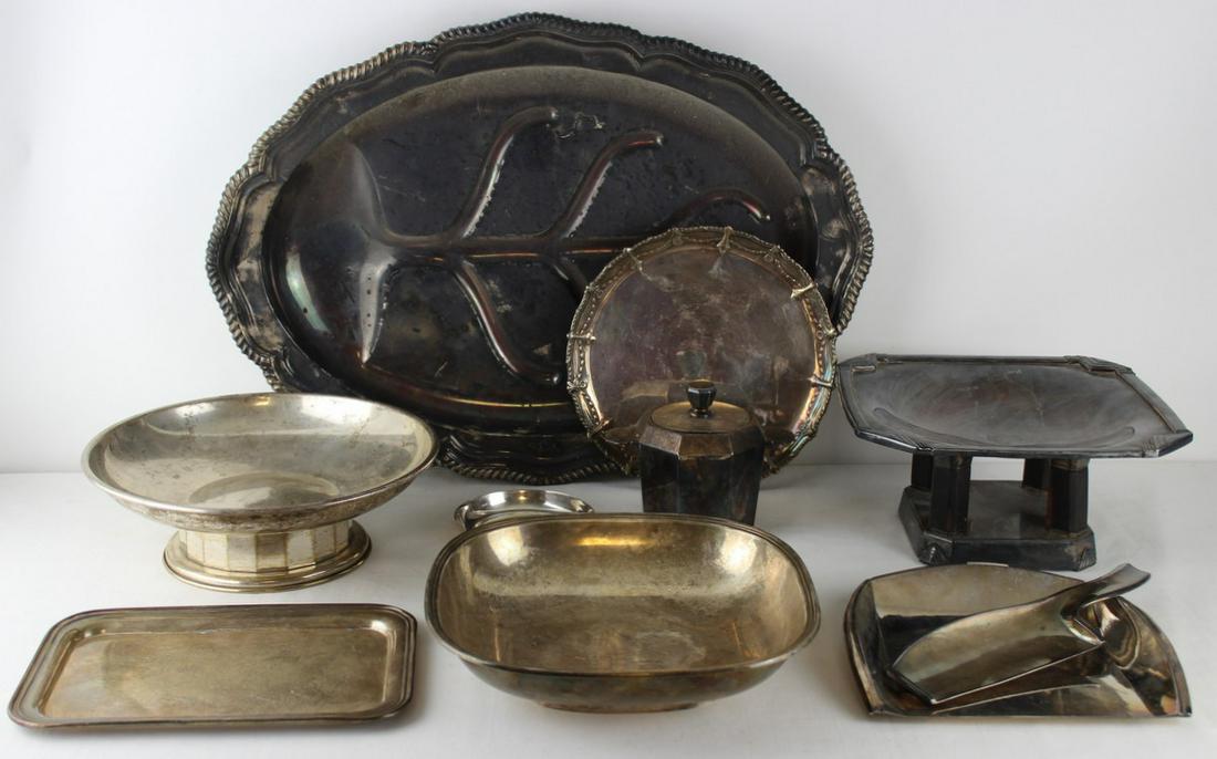 SILVERPLATE. Grouping of Silverplate Hollow Ware.: Includes a Tiffany & Co. silverplated meat tray - some pitting; a small Christofle silverplated bowl; an Ercuis French silverplate covered sugar?; a Mariage Freres center bowl with fluting to pede